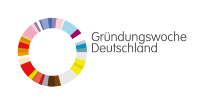 Logo Gründungswoche Deutschland. Bunter Kreis und graue Schrift "Gründungswoche Deutschland" auf weißem Hintergrund.